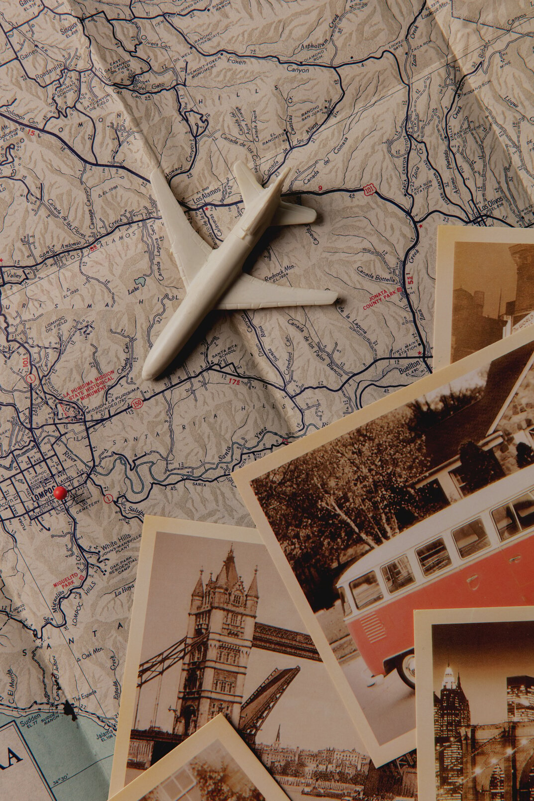 Plane Model with Old Photos on a Map 